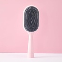 Mini Detangling Brush With Cleaning Tool